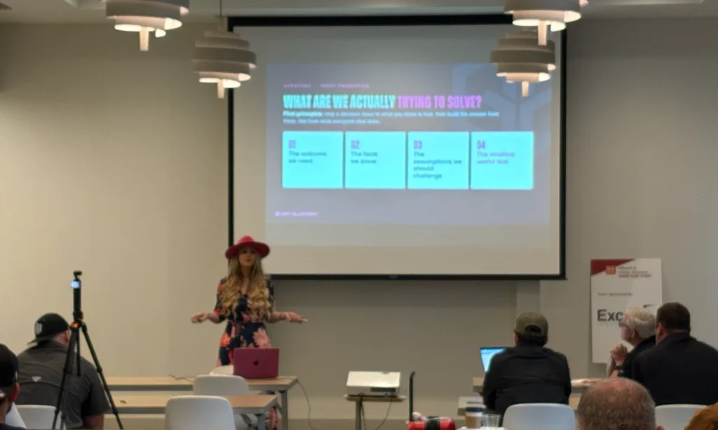 Stefanie Couch presents a slide that asks, What Are We Actually Trying to Solve?