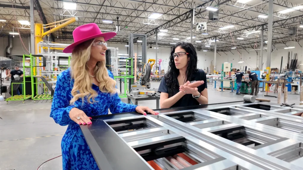 Stefanie Couch on a window and door production line with a guest