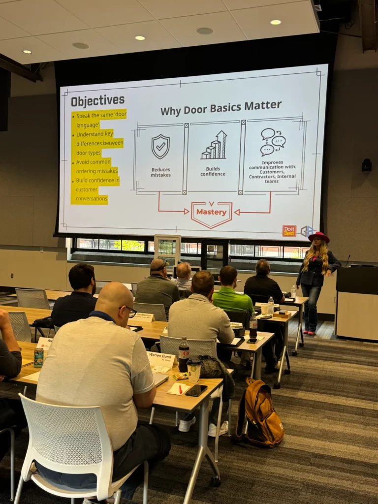 Millwork Academy attendees at Do it Best headquarters during a session on door basics