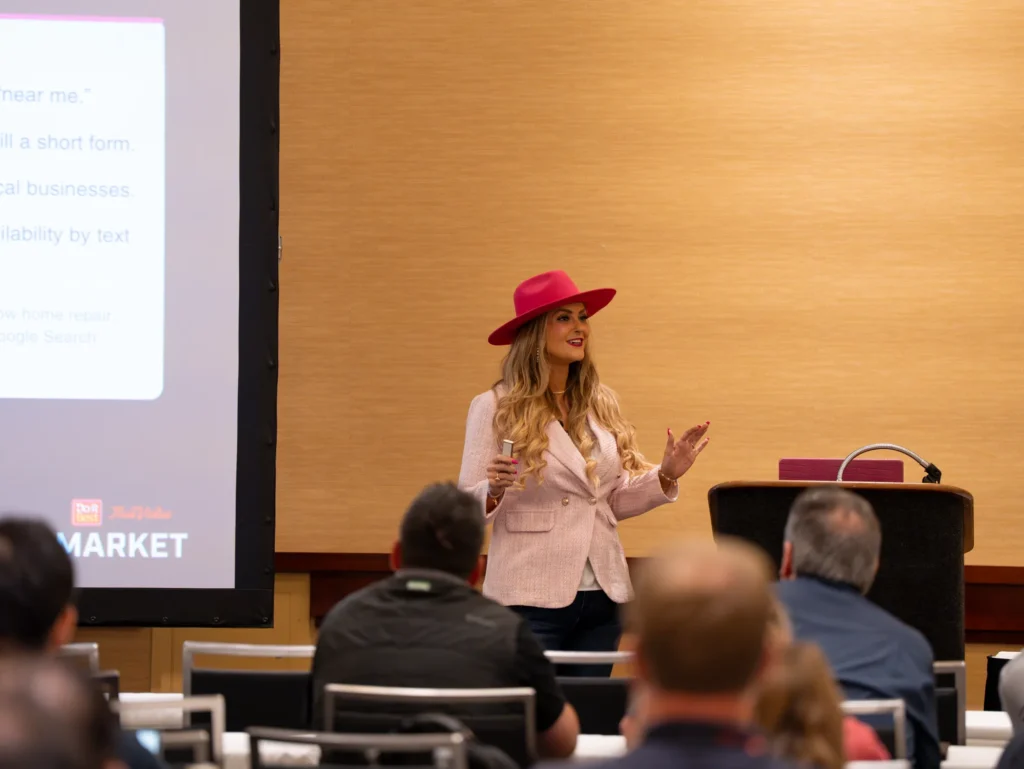 Stefanie Couch gesturing as she teaches a Do it Best LBM Millwork Academy session