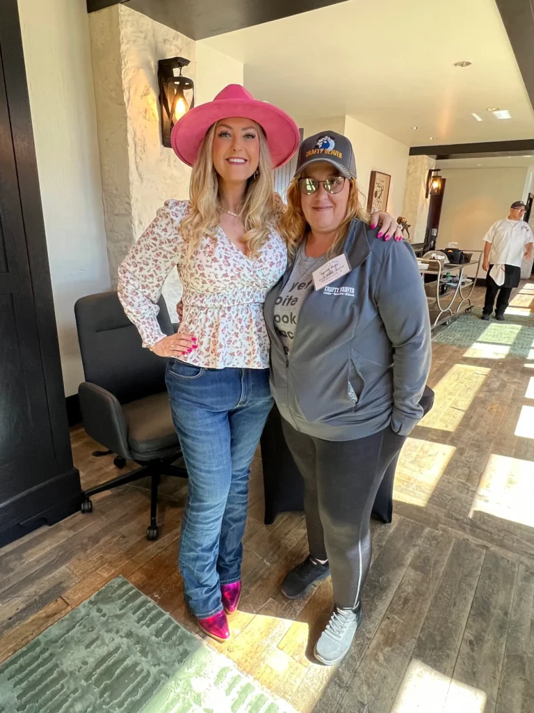 Stefanie Couch with an attendee inside Rough Creek Lodge at the Nation’s Best Women’s Leadership Retreat