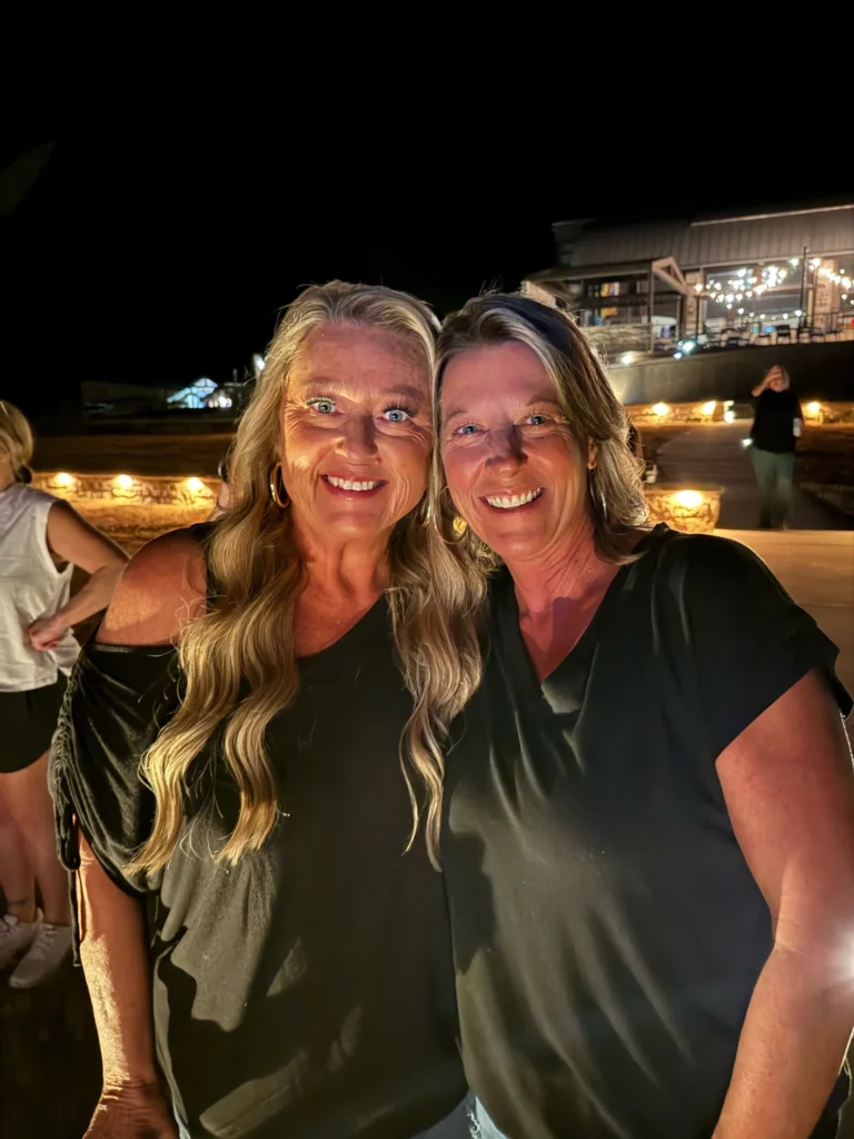 Two retreat attendees at an evening gathering at Rough Creek Lodge